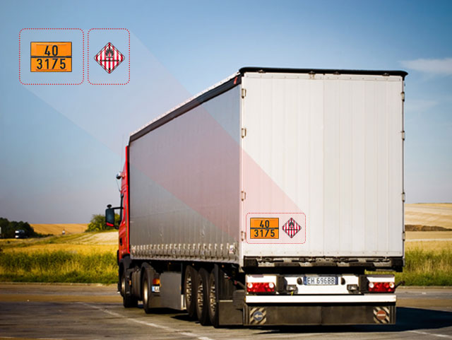 Truck With Hazmat Cargo Indicated by ADR and IMDG Signs